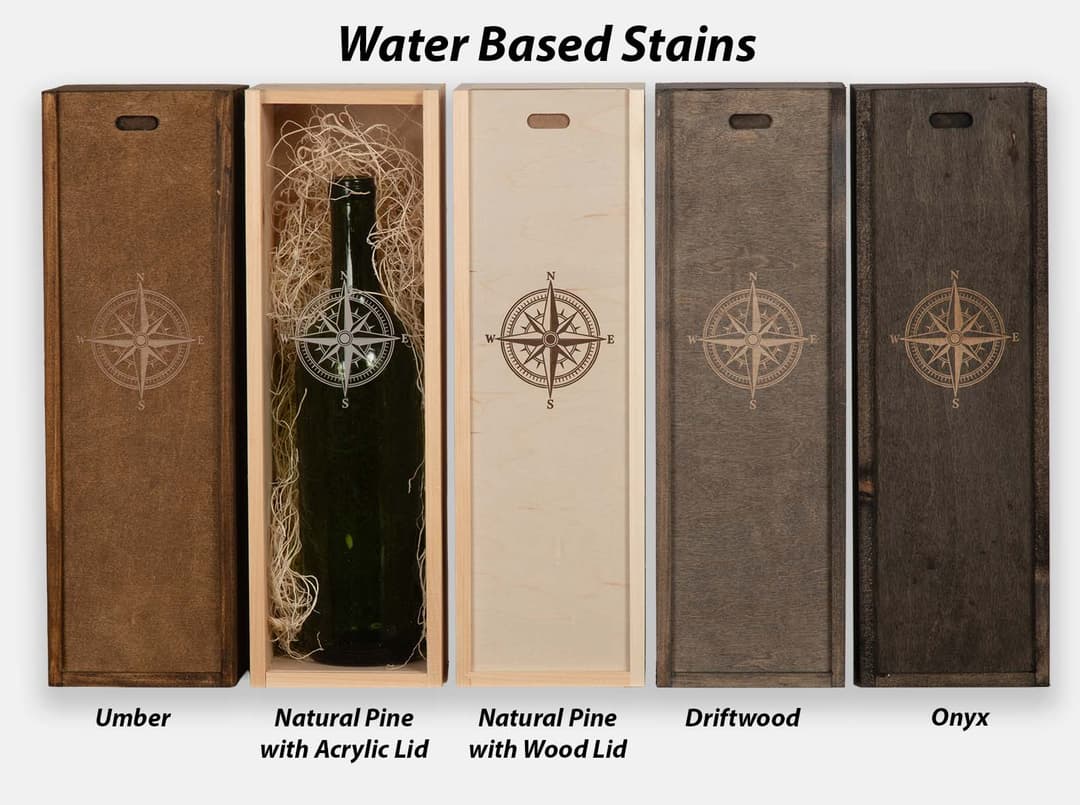 Single bottle sliding lid boxes with water based stains and laser engraved artwork. Box joint construction. Acrylic lid with laser engraved artwork. Wood excelsior included.