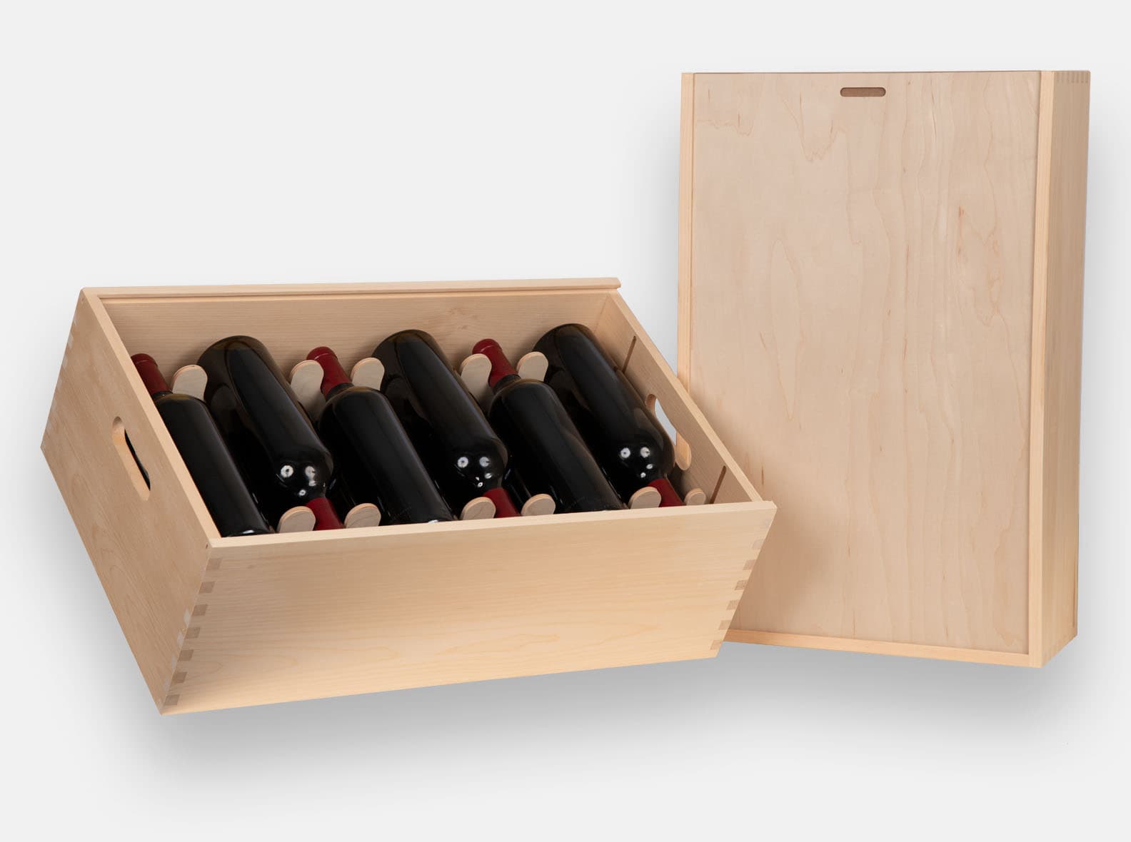 Wooden wine bottle gift box with sliding lid for 12 bottles. Removable yokes. Handles cut by CNC. Box joint construction. Wood imprint and laser logo branding for corporate promotion. Made in Canada.